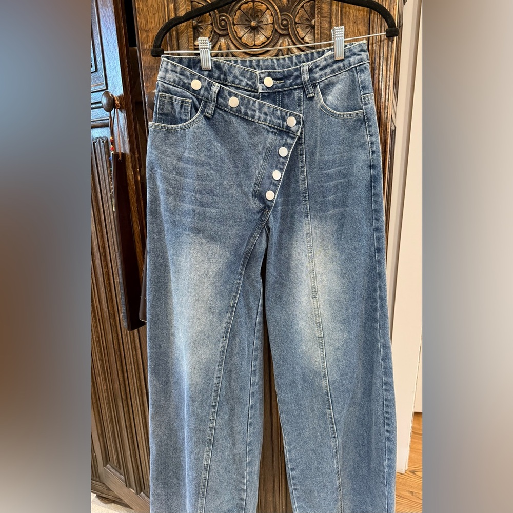 Classic Blue Denim Jeans
Asymmetrical button fly